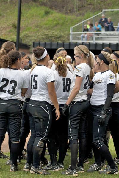 The softball team huddles Saturday afternoon during their game versus Georgia Southern. The Mountaineers lost to the Eagles 0-2 at home.  Courtney Roskos  |  The Appalachian 