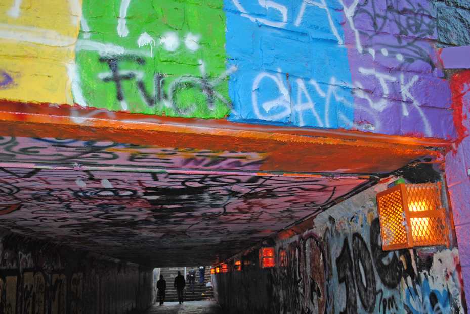 In October, LGBT Center volunteers painted the free expression tunnel for National Coming Out Day - but someone covered the painting with homophobic slurs. Photo by Madelyn Rindal | The Appalachian