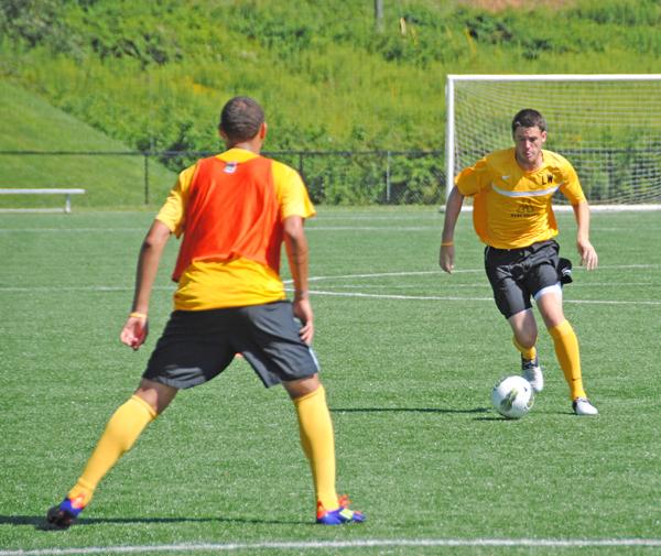 Sophomore midfielder Kristian Lee-Him prepares to capture the ball as senior defender Lee Williams approaches during Thursday morning's practice scrimmage at Ted Mackorell Soccer Complex. The men's soccer team begins its regular season Friday at home versus East Tennessee State. Olivia Wilkes | The Appalachian 
