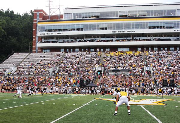 7,000 Appalachian fans gather in Kidd Brewer Stadium as Senior Sam Martin punts the ball down the in Saturday evenings scrimmage. Paul Heckert | The Appalachian 