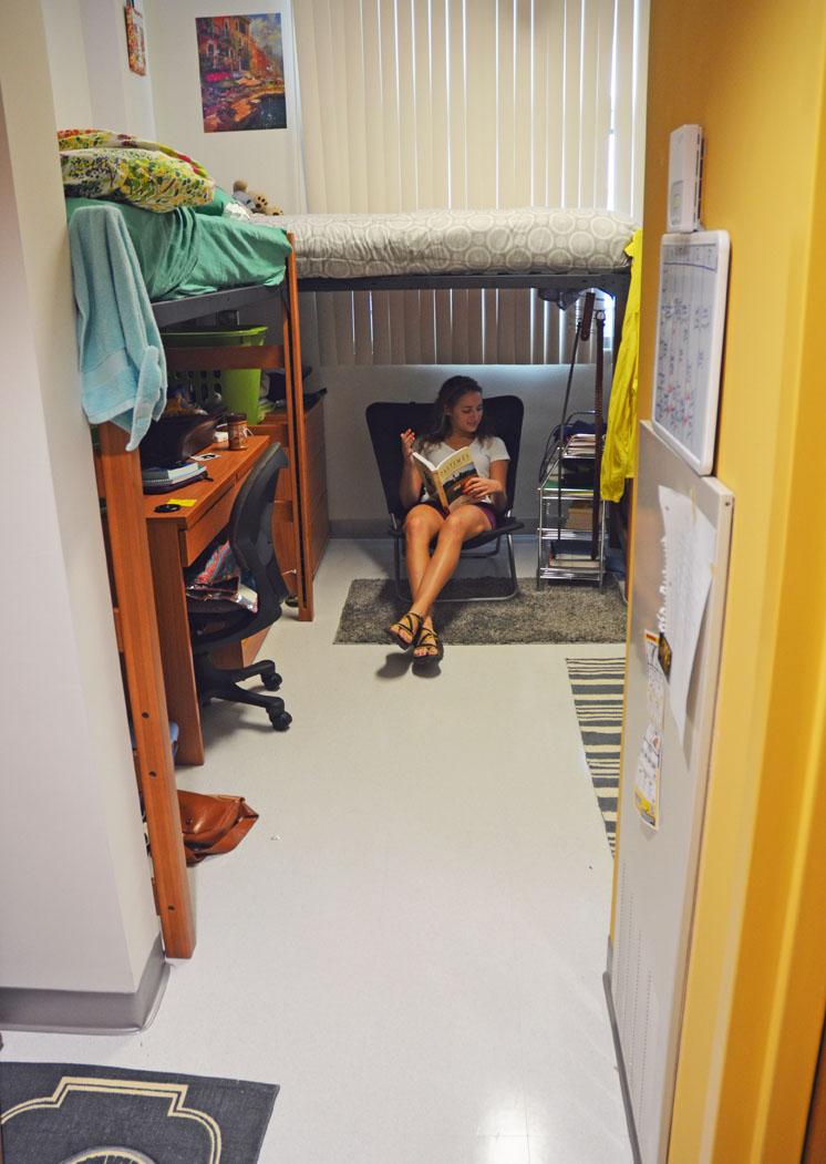 Sophomore Tessa Gossett sits in her room in Summit Hall. Some say Summit doesn't feel like an actual dorm. Maggie Cozens | The Appalachian 