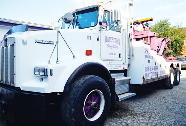 Hampton's Body Shop tows the cars on game day for the university. This past Saturday, the shop towed 29 cars total. Maggie Cozens | The Appalachian