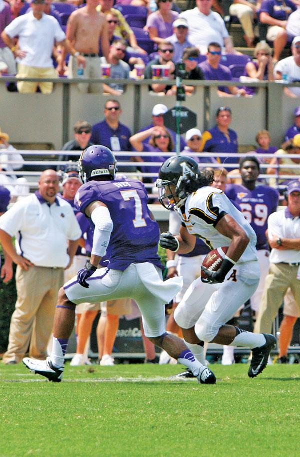 Freshman wide receiver Malachi Jones races down the field with the ball during Appalachian's game against ECU. Jones's father Andre played professionally for the Pittsburgh Steelers, Detroit Lions and Winnipeg Blue Bombers. Amy Birner | The Appalachian