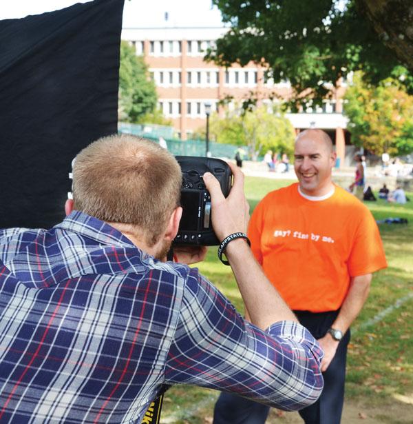 Senior global studies and technical photography major Drew Bennett takes a photo of Dean of Students J.J. Brown for the LGBT Center's 'Gay? Fine By Me' photo shoot last Thursday. The photoshoot is open to students Sept. 25. Michael Bragg | The Appalachian