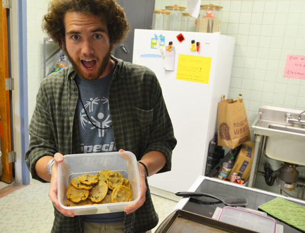 Junior public relations major Matt MIze holds up a batch of his cookies at the Wesely Foundation. Mize, who won a national award in high school for cooking, is known as the 'Cookie Man' on campus for handing out free cookies. Michael Bragg | The Appalachian