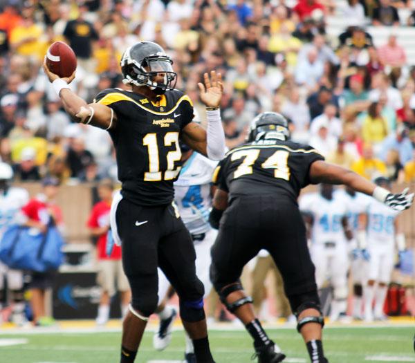 Quarterback Jamal Jackson prepares to gun the ball down the field during Saturday's game against The Citadel. Paul Heckert | The Appalachian