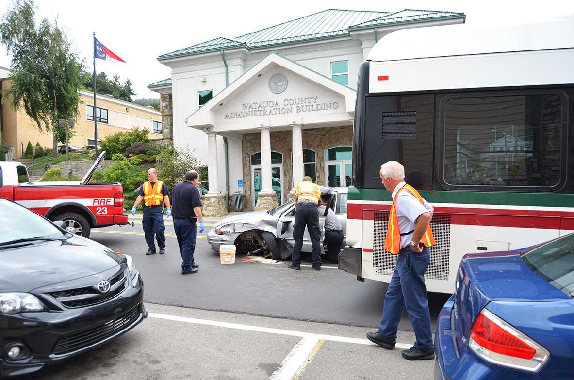 Firemen arrive on the scene Thursday morning after a collision between an Appalcart bus and car on Kings Street. Photo by Olivia Wilkes  |  The Appalachian