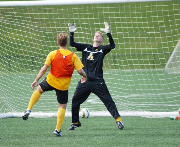 Junior goalkeeper Danny Free defends the goal during a men's soccer practice. Free came to Appalachian from Doncaster, England. Conor McClure | The Appalachian