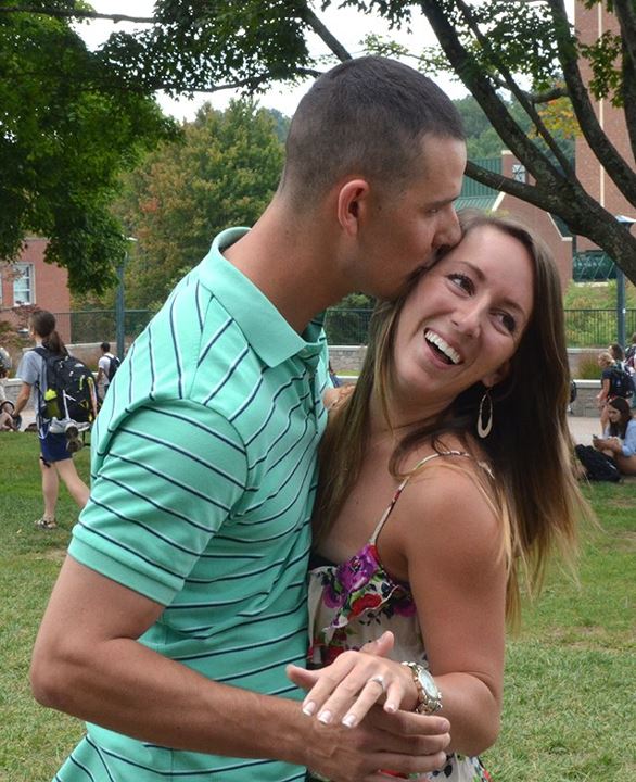 Navy sailor Phil Myers proposes to his girlfriend, senior health care management major Kasie Goforth, on Sanford Mall Aug. 29.