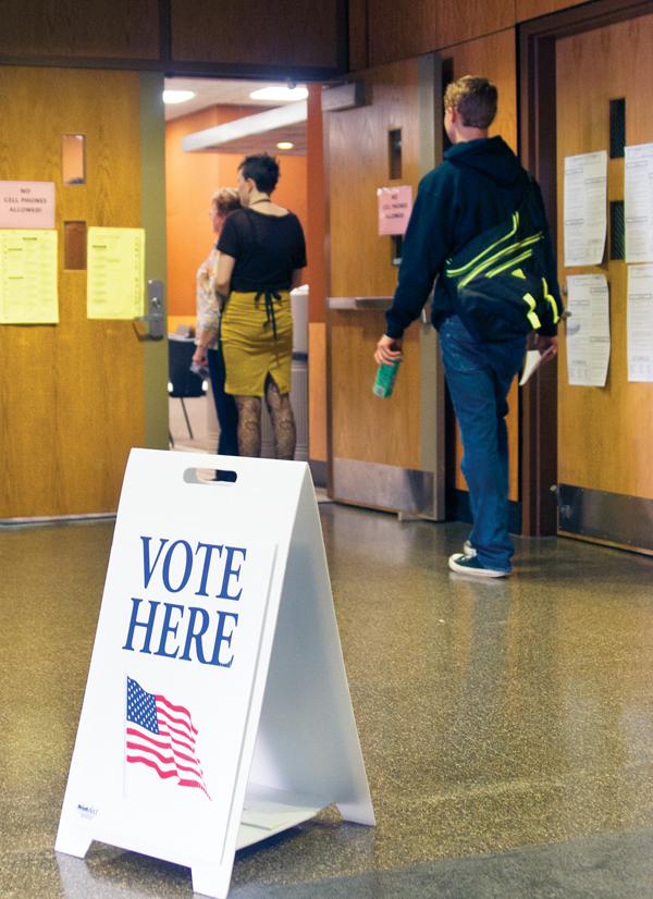 Students line up outside the Blue Ridge Ballroom for early voting Monday morning. Courtney Roskos | The Appalachian