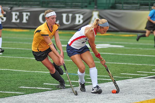 Sophomore midfielder Dana Wetmore fights for the ball during Friday's match against Liberty University. Liberty beat Appalachian 3-1. Justin Perry | The Appalachian