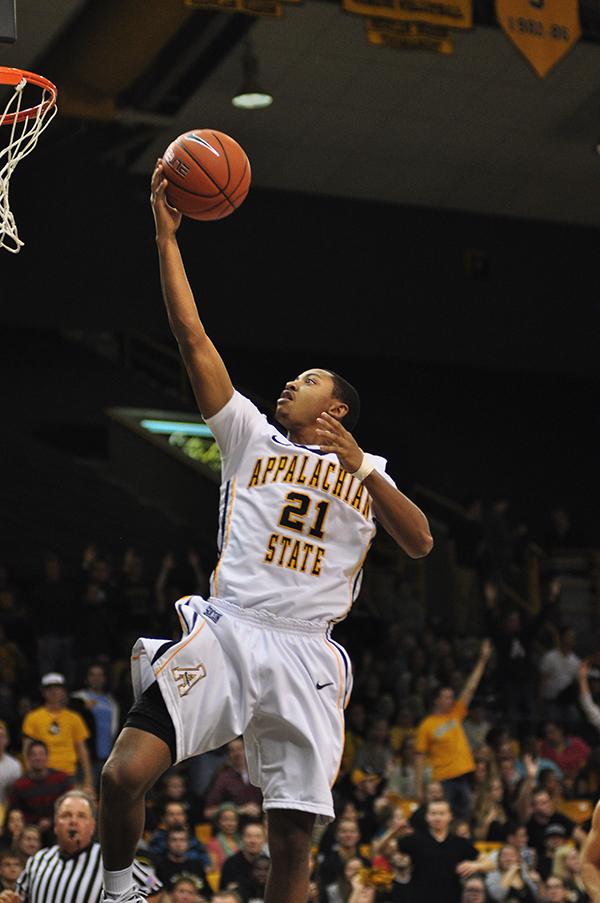 Freshman guard Frank Eaves reaches for a basket during last Friday's game against Montreat. The Mountaineers took the victory with a score of 86-50. Justin Perry | The Appalachian 