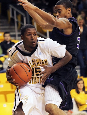 Sophmore forward Jay Canty powers through a High Point defender to move the ball towards the basket. Canty scored a game-high 23 points, the Panthers held their lead throught the game for an 86-64 win over the Mountaineers. Paul Heckert | The Appalachian