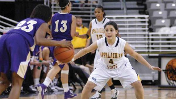 Sophomore guard Jessica Barrios defends the court during a 2010 women's basketball game. Barrios has recently rejoined the team after recovering from an ACL injury. Photo Courtesy Dave Mayo/GoAsu