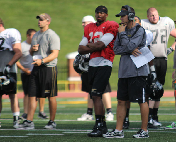 Scott Satterfield was announced as the new head coach for Appalachian State University's football team Friday. Here, Satterfield stands beside quarterback Jamal Jackson during an August practice. Paul Heckert | The Appalachian