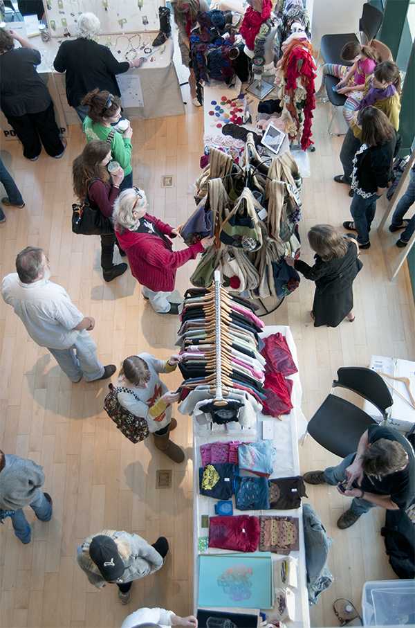 Locals browse through art, fashion, jewelry and other crafts Sunday afternoon at the Boone Handmade Market in Turchin Center for the Visual Arts. The event, sponsored by the Arts Management Organization, featured student and regional artists. Olivia Wilkes | The Appalachian