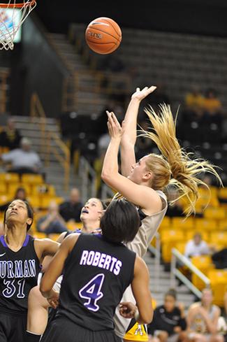 Senior forward Kelsey Sharkey lays the ball up during Monday's game against Furman. The Mountaineers beat the Paladins 68-58.