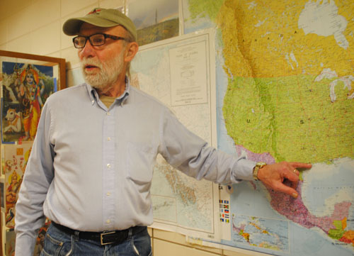 Anthropology professor Harvard Ayers shows on a map areas that will be affected by the pipeline. 