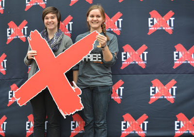 Senior interdisciplinary studies major Bethany Thomas (Left) and junior elementary education major Anika Goslen pose for a picture to support the END IT campaign.