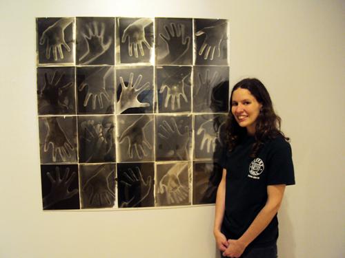 Senior studio art major Kelly Ensley stands with her photography piece chosen for this year’s Art Expo. The Art Expo is an annual exhibition of student work that will run until March 16 in the Turchin Center.  Kelly Ensley | Courtesy Photo