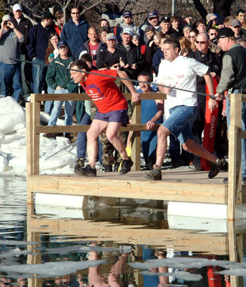 Appalachian State University Police Chief Gunther Doerr (Left) and Former Boone Police Chief Bill Post (Right) prepare to take an icy dip into Duck Pond for the 2004 Polar Plunge. Law enforcement agencies in Watauga County have raised money for Special Olympics athletes through the annual Polar Plunge at Duck Pond since 2000. Post has since retired and now teaches in the criminal justice department.  Marie Freeman | Courtesy Photo