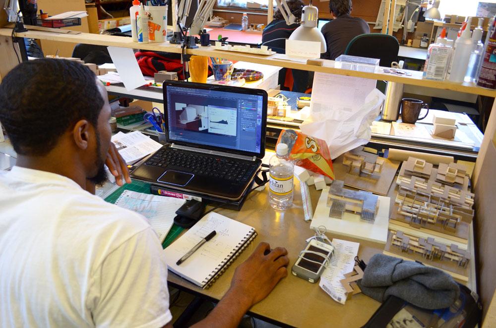 Senior building science major Tony Washington works on his seventh concept model in a Katherine Harper lab. Appalachian State University was one of the three American universities to be chosen for the 2014 Solar Decathlon in Versailles, France. Michelle Pierce | The Appalachian 