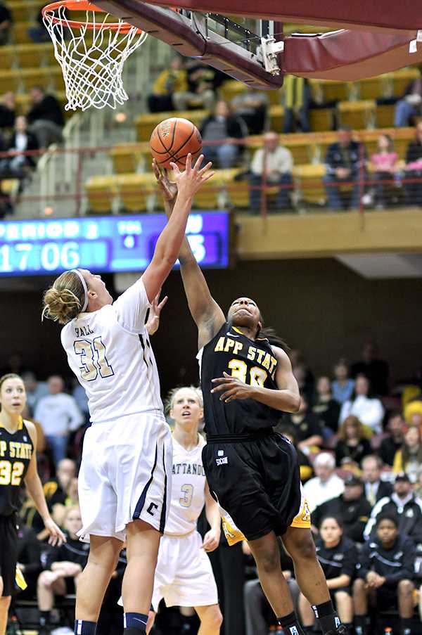 Senior Forward Courtney Freeman's layup narrowly gets past a defender during Sunday's SoCon semifinal match against Chattanooga. The Mountaineers fought hard against the Mocs during both halves with the score tying 16 times, but lost 67-72.  Justin Perry  |  The Appalachian