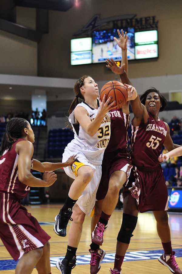 Senior forward Anna Freeman attempts a layup during the second round of the SoCon Tournament against College of Charleston. The Mountaineers held their ground in final minutes of the second half securing a 74-60 win against the Cougars. Appalachian will go on to play Chattanooga in the semifinals Sunday at noon.  Justin Perry  |  The Appalachian