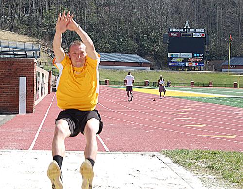 Sophomore jumper Henry Bustle practices the long jump earlier this week. He has 15 top-5 finishes, including second at the SoCon Indoor Championship.  James Ashley  |  The Appalachian