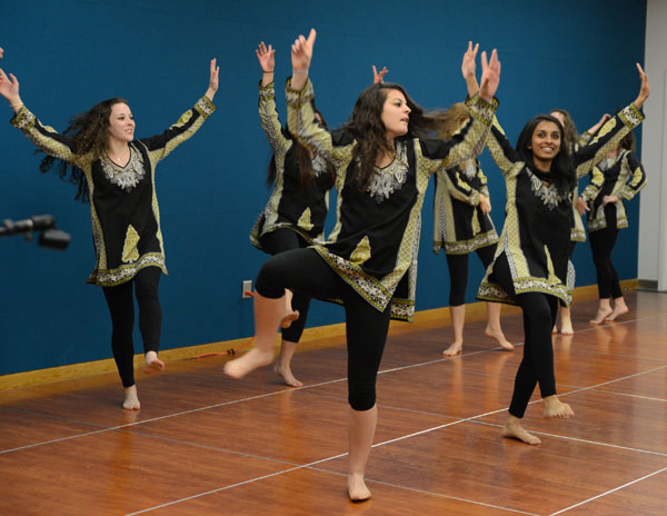 Senior Spanish major Nadareh Naseri (center) leads a performance Tuesday night as part of the Diversity Celebration. The Diversity Celebration is held once a year to expose students to multicultural lifestyles through craft workshops, performances, ethnic food tastings and more. Olivia Wilkes | The Appalachian