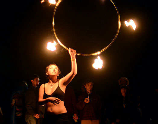 Sophomore interdisciplinary studies major Molly Clay performs fire hooping Saturday night at Boone in Blossom. Boone in Blossom was held over the weekend at High Country Fairgrounds and included musical performances, workshops, meditation sessions and more.  Olivia Wilkes  |  The Appalachian 