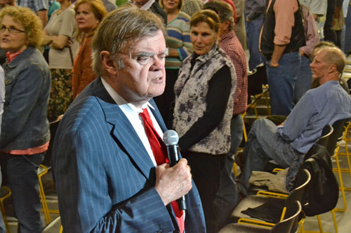 Garrison Keillor sings hymns with his audience during a standing intermission at his show ‘A Brand New Retrospective’ on Tuesday night at Holmes Convocation Center. Keillor, known for his NPR program ‘A Prairie Home Companion,’ shared stories from his life after the event began with a performance by the Mountain Home Bluegrass Boys.  Mark Kenna  |  The Appalachian 