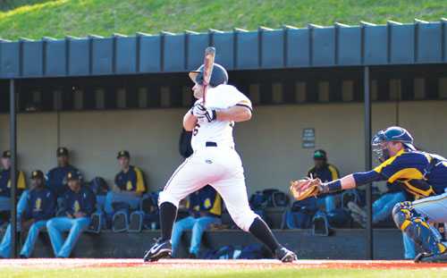 Senior walk-on Gabe Dimock follows through on a swing in last Tuesday’s game against N.C. A&T.  Aneisy Cardo  |  The Appalachian