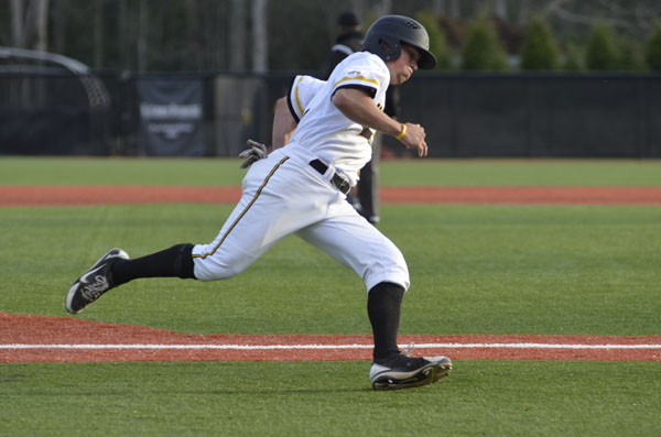 Junior outfielder Preston Troutman runs home to score during the second inning of last Tuesday’s game against N.C. A&T. The team won the game 7-3.  Aneisy Cardo  |  The Appalachian