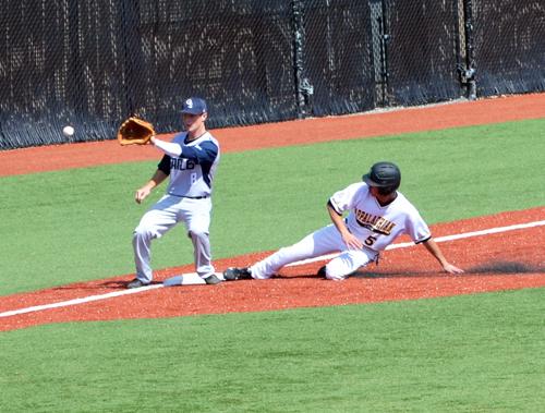 Junior outfielder William Head safely slides onto third base in Saturday’s game against Georgia Southern.  Chelsey Fisher  |  The Appalachian