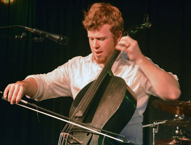 Everett Hardin, cellist of the Boone-based band the New River Boys, plays in a February performance at Legends. The New River boys will perform Thursday at Galileo’s for a fundraising event with Appalachian State’s Wine To Water Club.  Michael Bragg  |  The Appalachian