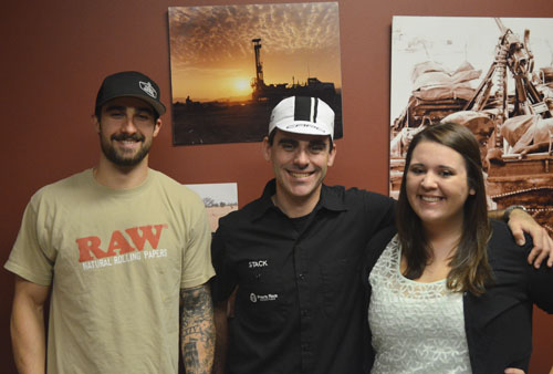 (Left to right) Wine to Water Campus and Media Coordinator Josh Elliott, Pirate Race Productions owner Andrew Stackhouse and ASU Wine to Water President Katy Cook. ASU Wine to Water helped raise $1,000 Saturday at the Boone-Roubaix Bicycle Race to go toward the nonprofit's well projects in Cambodia. Michael Bragg  |  The Appalachian