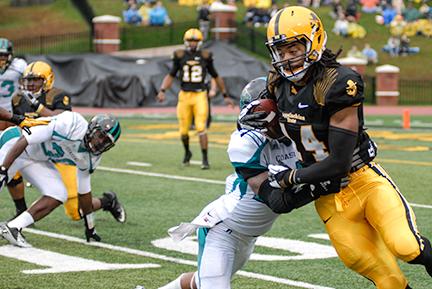 Wide receiver Sean Price makes a catch during a game in the 2012 season. Price has been suspended from an undetermined amount of games for a violation of team rules.  File Photo  |  The Appalachian