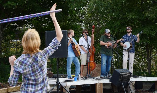 Local bluegrass band Upright and Breathin' performs during the Howard Street Exchange on Sunday afternoon. Boone Community Network hosted the event downtown to support local artists and musicians. Photo by Olivia Wilkes  |  The Appalachian