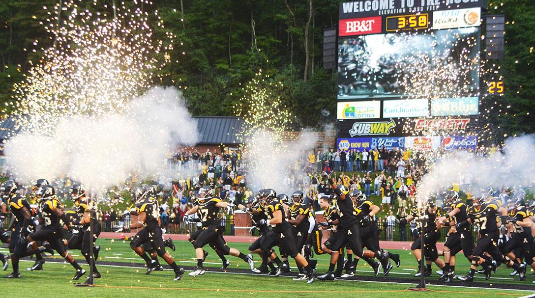 The Appalachian football team rushes onto the field Sept. 8 for their first home game of the 2012 football season. The Mountaineers faced off against Montana, taking the victory 35-27. Photo by Maggie Cozens  |  The Appalachian