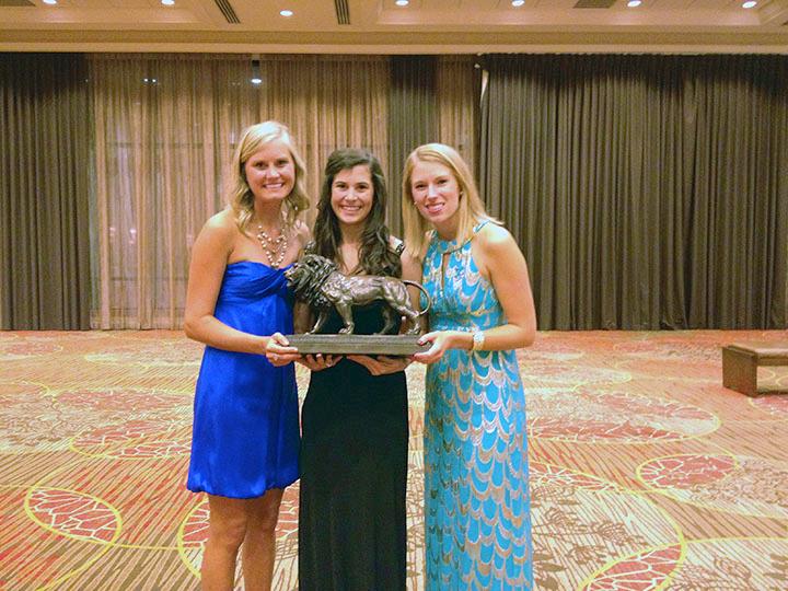 (left to right) Alpha Delta Pi presidents past and present Molly Elliot (2012), Alexis Wilkins (2013) and Laura Stewart (2011) are presented with The Golden Lion award earlier this year. The Golden Lion award recognizes leadership and community participation and is the highest chapter performance award that can be received.  Photo courtesy of Alexis Wilkins.