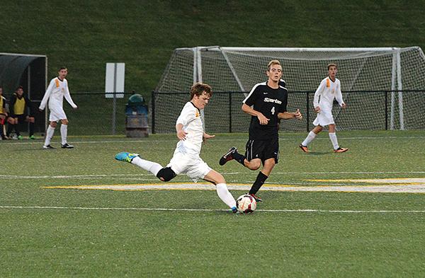 Sophomore midfielder Matthew Melton kicks the ball down the field Saturday night at a home game against USC-Upstate. The Mountaineers tied with the Spartans 1-1. Photo by Olivia Wilkes  |  The Appalachian