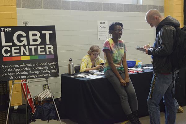 Freshman English major Amber Daniels (left) approaches freshman criminal justice major Jason Piotrowski (right) to sign the LGBT Center's petition during Wednesday's blood drive. The LGBT Center was petitioning to end the MSM Blood Bans. Photo by Courtney Roskos  |  The Appalachian