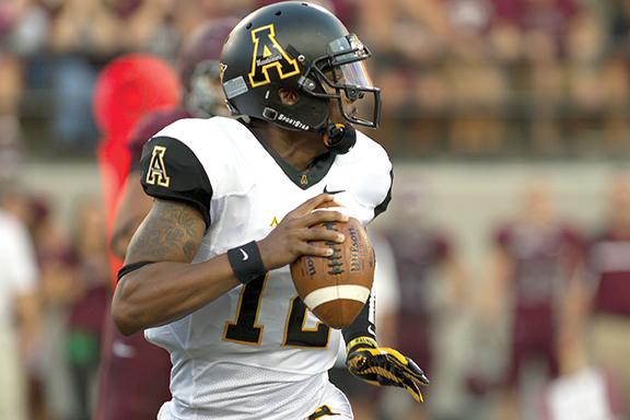 Senior quarterback Jamal Londry-Jackson looks for an open man during last Saturday’s game against Montana. The Mountaineers fell to the Grizzlies 30-6. Photo courtesy of Meghan Nolt  |  Montana Kaimin