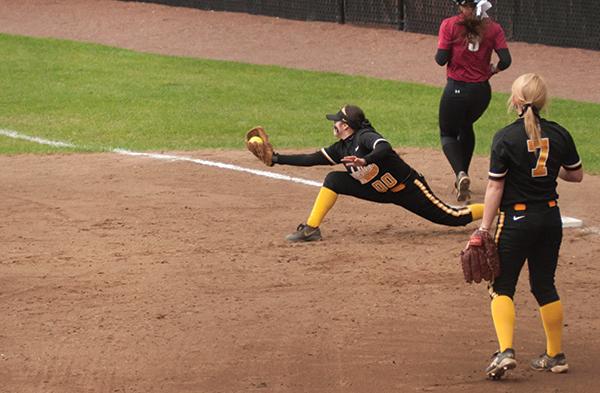 Sophomore first basemen Ellie Manriquez snags the ball with an outstretched glove in the Sunday double-header scrimmage against Lenoir-Rhyne. The Mountaineers won both games.  Photo by Kim Reynolds  |  The Appalachian