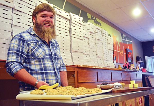 Senior entrepreneurship and marketing major David Holloman prepares for the opening of his new business, the Appalachia Cookie Company. The company, slated for an early-November opening, will make late-night cookie deliveries, cater and take shipping orders. Photo by Maggie Cozens  |  The Appalachian