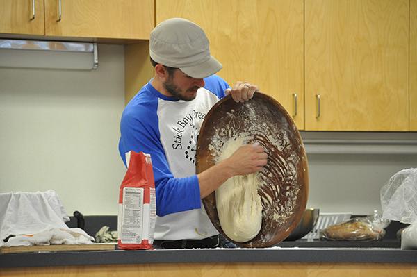 Jeremy Bollman demonstrates bread-making techniques, which he uses to create different pastries as head baker of Stick Boy Bread Company.  Kim Reynolds  |  The Appalachian