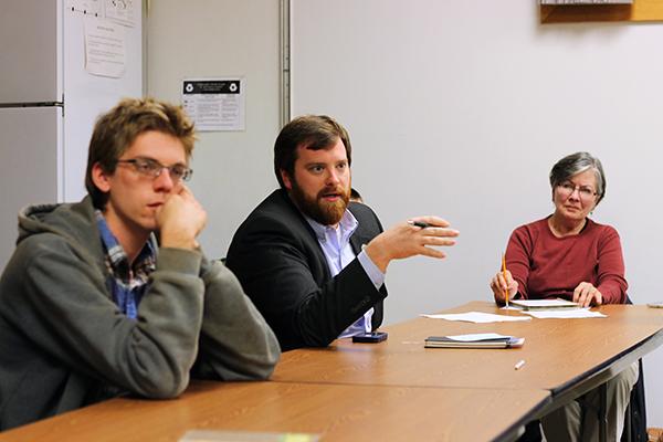 Mayoral candidate Andy Ball (center) sits in on a PHARMN (Preserve Heritage Agriculture and Regional Markets) meeting with Ben Loomis (left) and PHARMN board member Susan Miller (right) . Ball gave his opinions on furture PHARMN partnerships within the community. PHARMN is an organization which supports the Watauga County Farmers Market and local agriculture. Photo by Molly Cogburn  |  The Appalachian