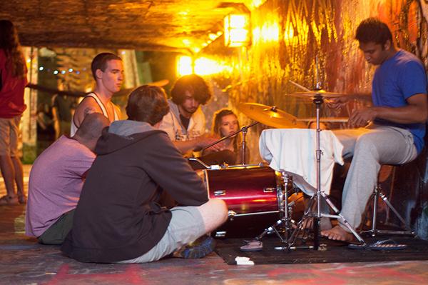 Sophomore sustainability major Pranav Gogate (right) performs a drum solo during last week’s Tunnel Tuesday. The weekly event was created spontaneously by a group of students who gathered regularly to perform music on the west side of campus has now turned into a major attraction. Photo by Kim Reynolds  |  The Appalachian