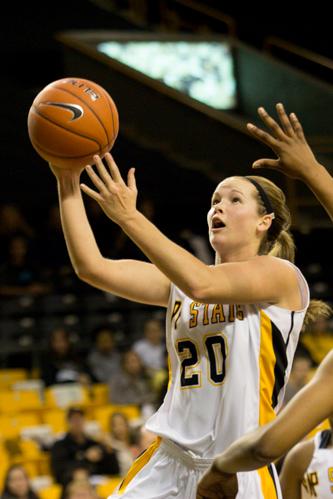 Junior guard Katie Mallow swoops through the paint for a layup in the home double-header as App State lost to ETSU 81-72. Mallow finished with 19 points, tying the team high. Paul Heckert | The Appalachian